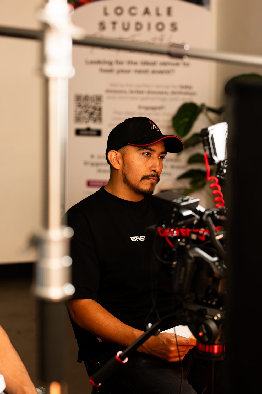 Jose Perez, documentary filmmaker, behind the camera on set